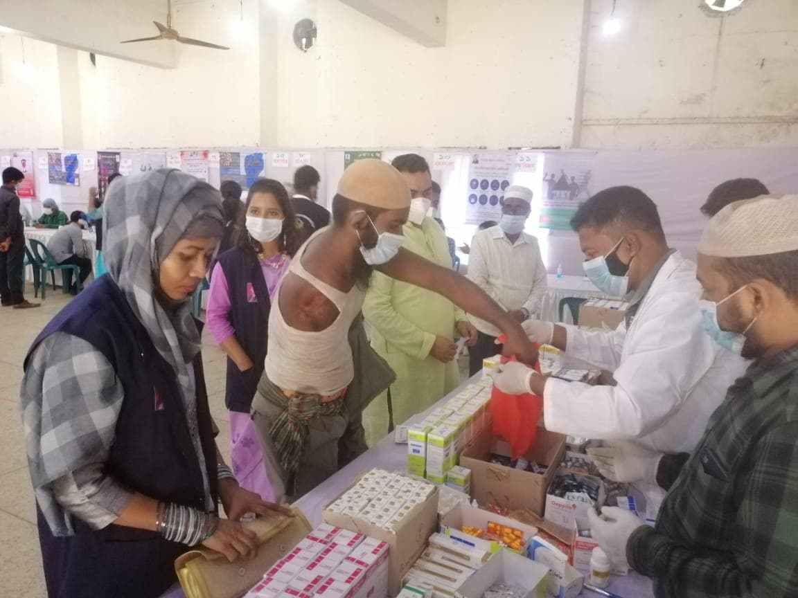 Distributing medicine at a medical camp